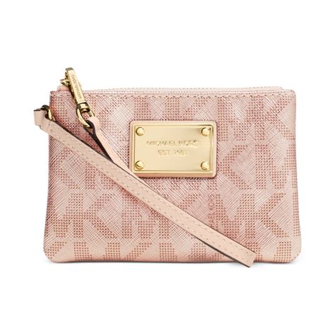 michael kors rose gold glitter wristlet|Michael Kors pink clutch.